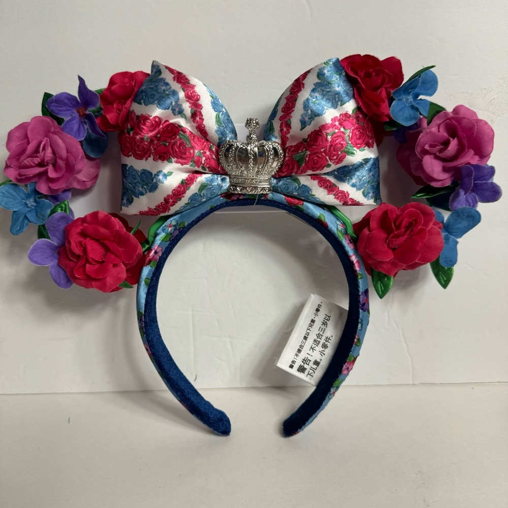 NWT. Disney EPCOT Queen Of The Kingdom UK Floral Minnie Mouse Ears Headband Rose